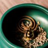 Mosquito Coil In a Green Bowl