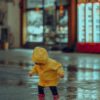 Child Jumping in Puddle