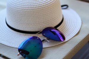 sunglasses, cap, coneflower