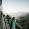 A Person Wearing a Socks while Chilling on a Hammock