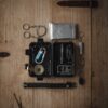 Top View of a Survival Kit Lying on a Wooden Surface